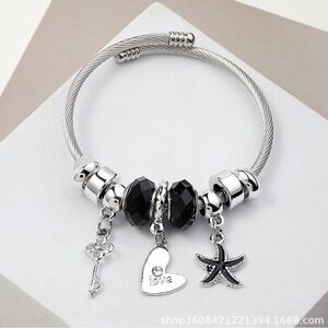 Silver and Black Charm Bracelet